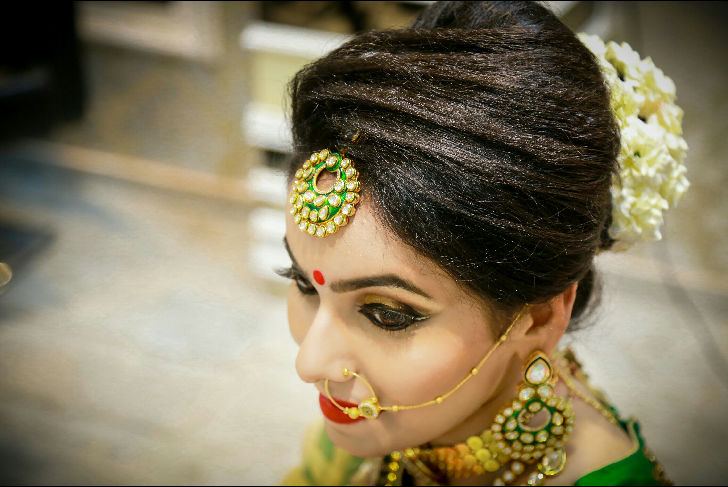 indian bridal look in natural flower bun. – iconedestyle